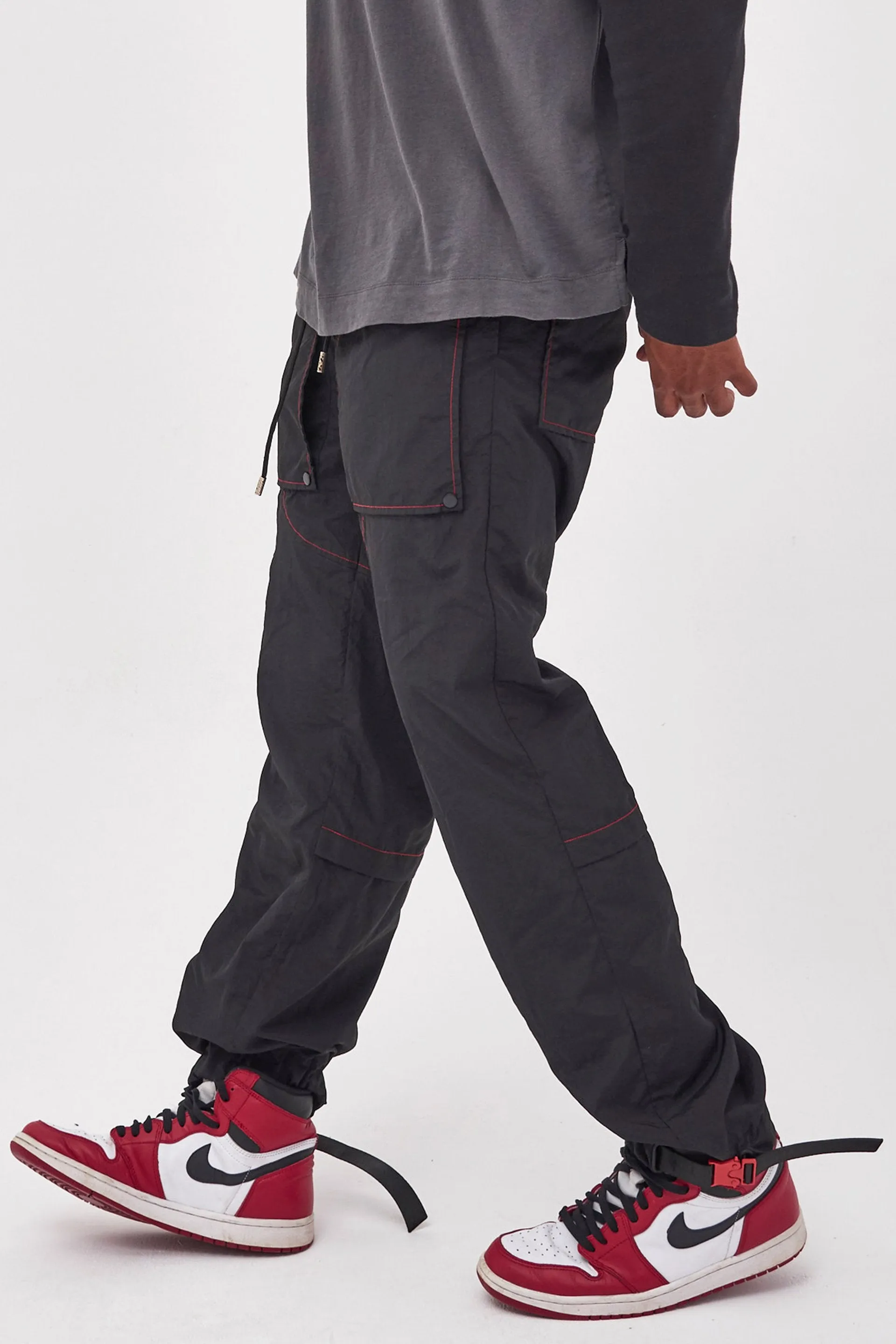 Black Nylon Joggers With Red Stitching Detail